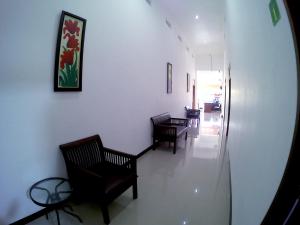 Area soggiorno di Amaryllis Guesthouse Syariah