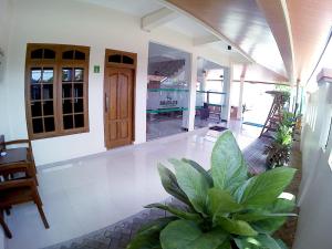 Area soggiorno di Amaryllis Guesthouse Syariah