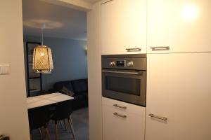Kuchyň nebo kuchyňský kout v ubytování Bleyendaal aan Zee