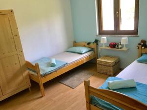 a bedroom with two bunk beds and a window at Villa Daisy in Tar +41 photos