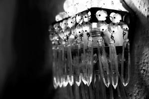 a row of wine glasses hanging on a wall at Agriturismo la Molina in Spigno Monferrato