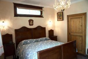 Postel nebo postele na pokoji v ubytování Agriturismo la Molina
