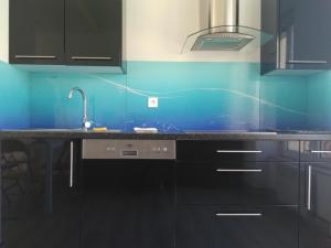 Kuchyň nebo kuchyňský kout v ubytování Appartement Vue Mer