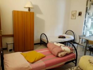Cama o camas de una habitación en Bed in Siena