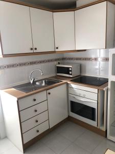 Kuchyňa alebo kuchynka v ubytovaní Parc Loix apartment