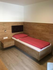 Postel nebo postele na pokoji v ubytování Hotel Sonnenheim
