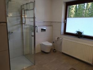 Ένα μπάνιο στο Ferienwohnung Libelle