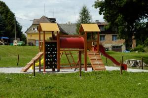 a playground with a slide in a park at Päitara Hof in Mariánské Lázně