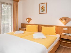 Voodi või voodid majutusasutuse Pension Moser toas