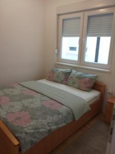 Ένα ή περισσότερα κρεβάτια σε δωμάτιο στο Studio Centar