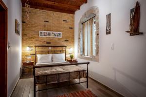 
A bed or beds in a room at Cretan Villa
