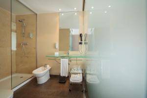 Koupelna v ubytování Hotel Salymar