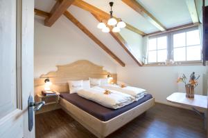 Un pat sau paturi într-o cameră la Parggenhof