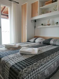 Säng eller sängar i ett rum på Santa Marina
