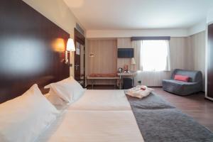 Postel nebo postele na pokoji v ubytování Hotel Salymar