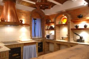 Kuchyň nebo kuchyňský kout v ubytování Guadalete