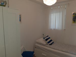 Postel nebo postele na pokoji v ubytování Apartment Mediterraneo