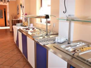 Kuchyň nebo kuchyňský kout v ubytování Hotel Bergmühle