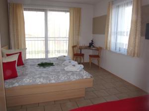 Postel nebo postele na pokoji v ubytování Hotel Bergmühle