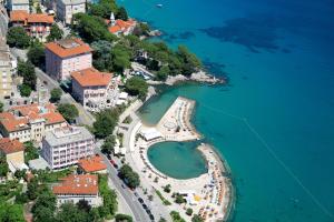 an aerial view of a town next to the water at Hotel Mozart in Opatija