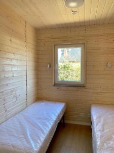 Posteľ alebo postele v izbe v ubytovaní Domek Pod Gruszą