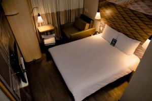 Letto o letti in una camera di Ibis Lorena - Circuito da Fé