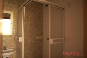 Kylpyhuone majoituspaikassa Hostal Malania