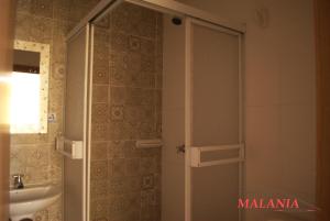Koupelna v ubytování Hostal Malania + 25 fotografií
