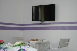 TV a/nebo společenská místnost v ubytování I Villini Affittacamere
