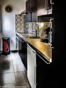 Kuchyň nebo kuchyňský kout v ubytování Un petit coin de paradis + 6 fotografií