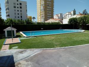 Swimmingpoolen hos eller tæt på Fantástico apartamento cerca de la playa