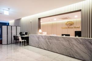 Vstupní hala nebo recepce v ubytování Golden River Hotel