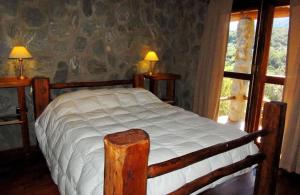 Ліжко або ліжка в номері ASM CABAÑAS XIII