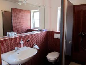 Koupelna v ubytování Hotel Weinblatt
