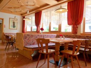 Restoranas ar kita vieta pavalgyti apgyvendinimo įstaigoje Chalet Hotel Diamant