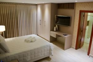 Una cama o camas en una habitación de Hotel Staufenberg