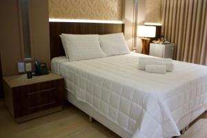 Una cama o camas en una habitación de Hotel Staufenberg