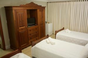 Una cama o camas en una habitación de Hotel Staufenberg