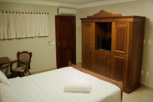 Una cama o camas en una habitación de Hotel Staufenberg