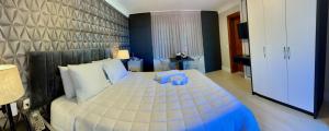 Una cama o camas en una habitación de Hotel Staufenberg