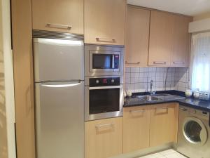 Kuchyň nebo kuchyňský kout v ubytování apartamento en zona costera, muy cerquita de la playa