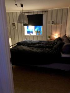 Säng eller sängar i ett rum på Nordhagen Gate