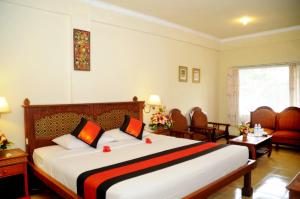 Postel nebo postele na pokoji v ubytování Melasti Beach Resort & Spa Legian