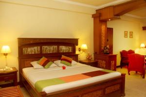 Postel nebo postele na pokoji v ubytování Melasti Beach Resort & Spa Legian
