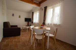 TV a/nebo společenská místnost v ubytování Residence Mama