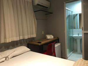 Postel nebo postele na pokoji v ubytování NUMAR Hotel
