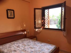 Katil atau katil-katil dalam bilik di Contrada santa venere Villa