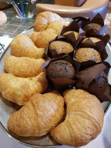 a plate of pastries with chocolate on a table at Camrose Resort Casino in Camrose