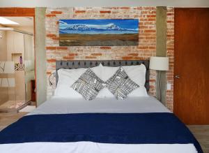 Llit o llits en una habitació de Habitaciones Coyoacan (UNAM)