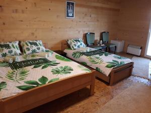 Postel nebo postele na pokoji v ubytování Apartments in Nature